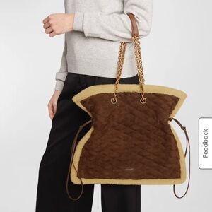 Saint Laurent Pochon shearling suede bag